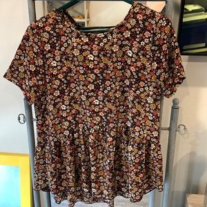 Floral shirt/blouse. Black, with cream, red, pink, & mustard yellow flowers.